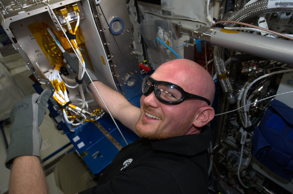 ESA astronaut Alexander Gerst working with Electromagnetic levitator