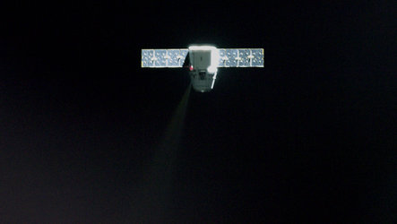 Dragon spacecraft approaching Space Station
