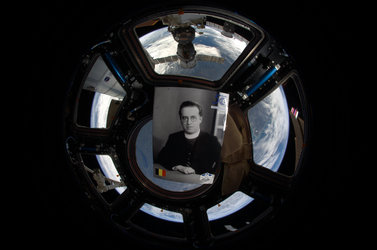 Portrait of Georges Lemaître floating in the Cupola of the ISS