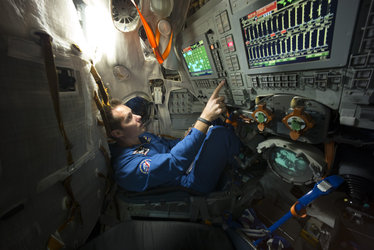 Thomas during training in the Soyuz TMA simulator
