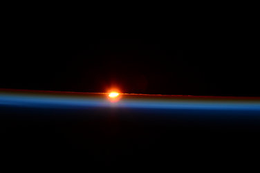 Eclipsed sunrise seen from International Space Station