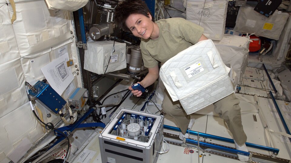 ESA astronaut Samantha Cristoforetti working with Kubik in space