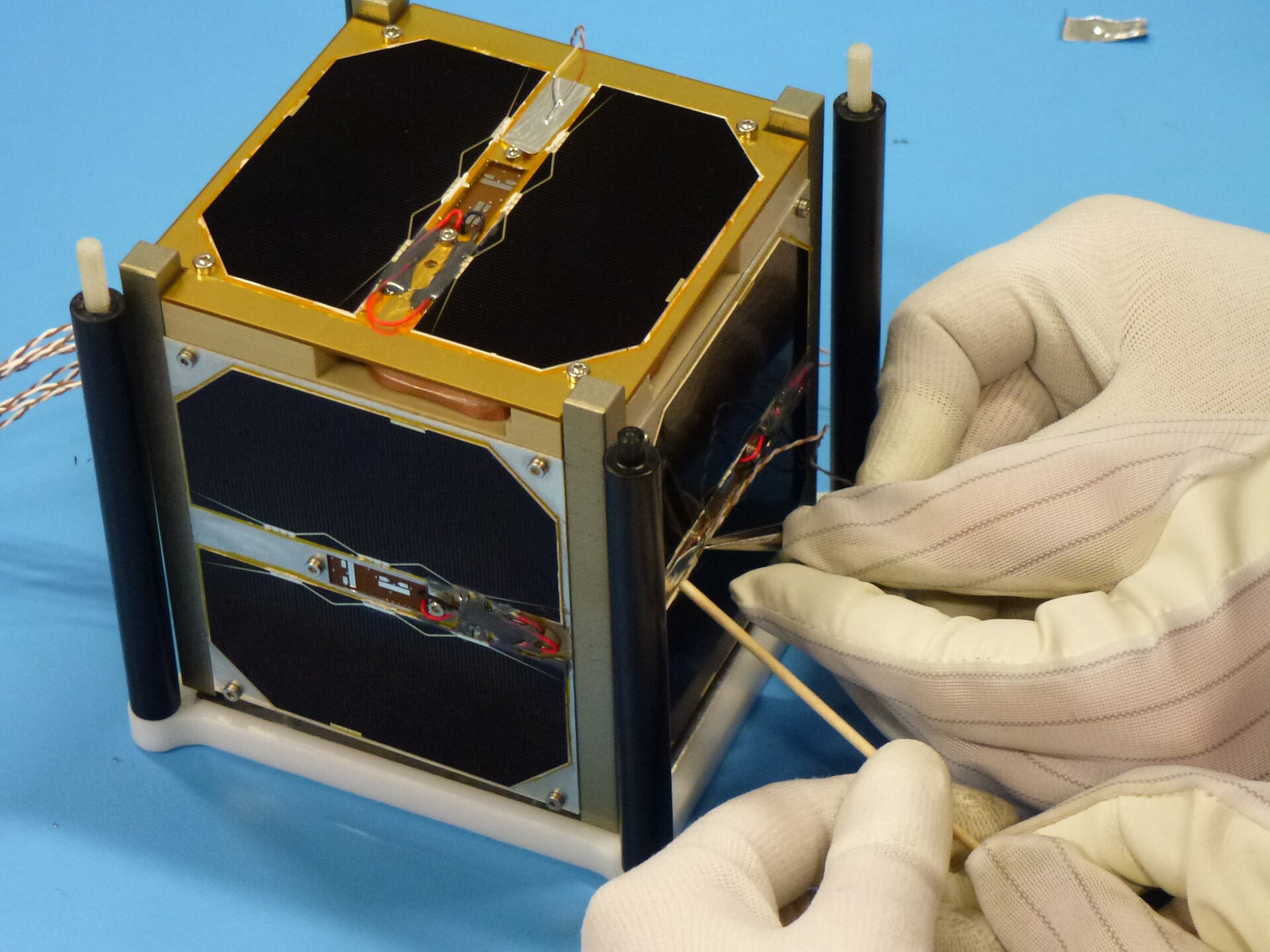 Attaching external thermocouples to CubeSat 