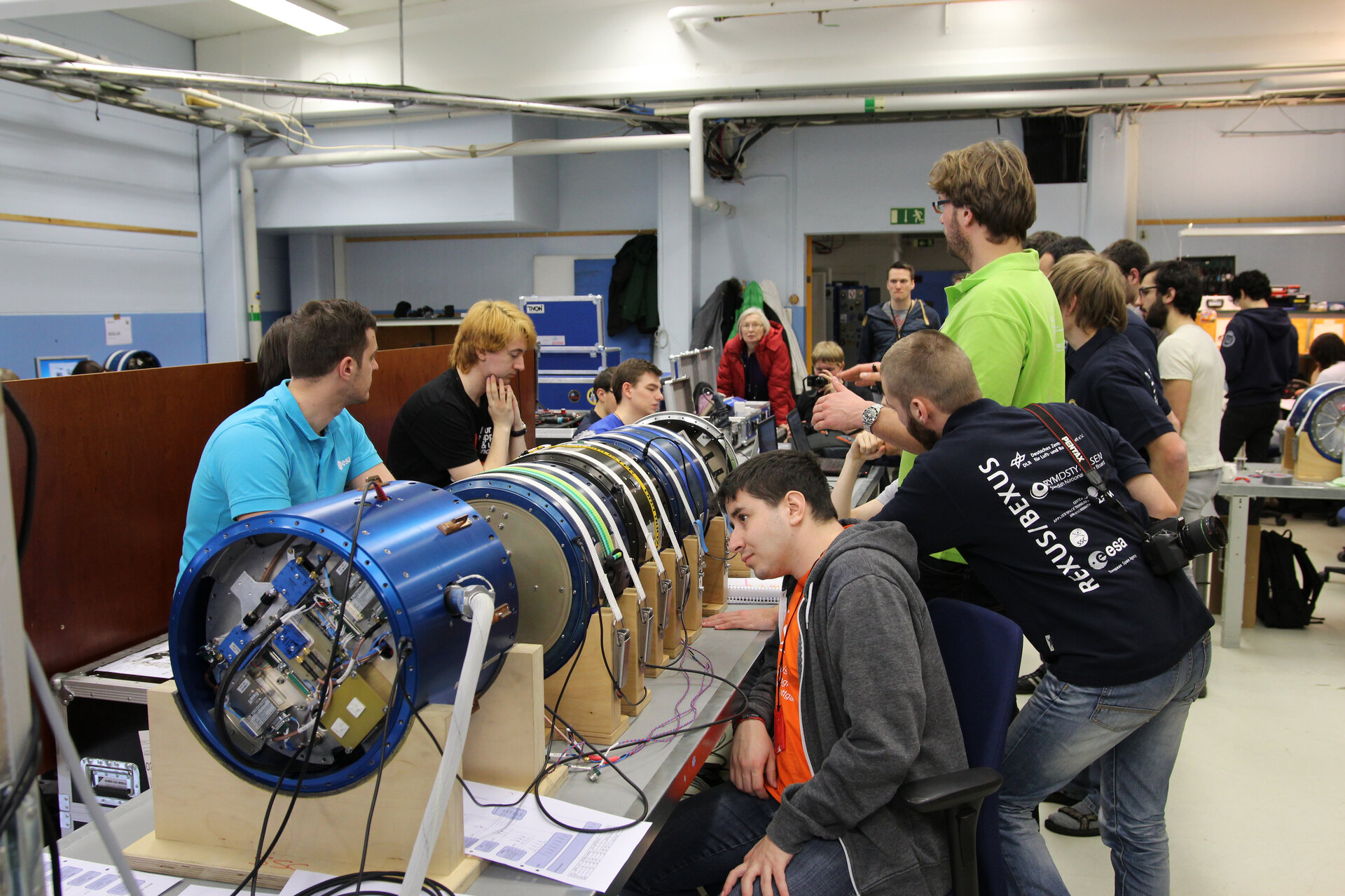 Students performing final tests on rocket