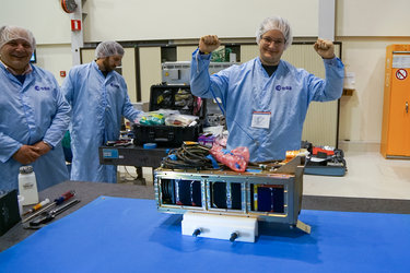 The three CubeSats nicely fitting into their orbital deployer