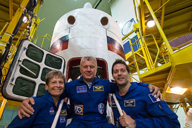 Peggy, Oleg and Thomas in front of Soyuz