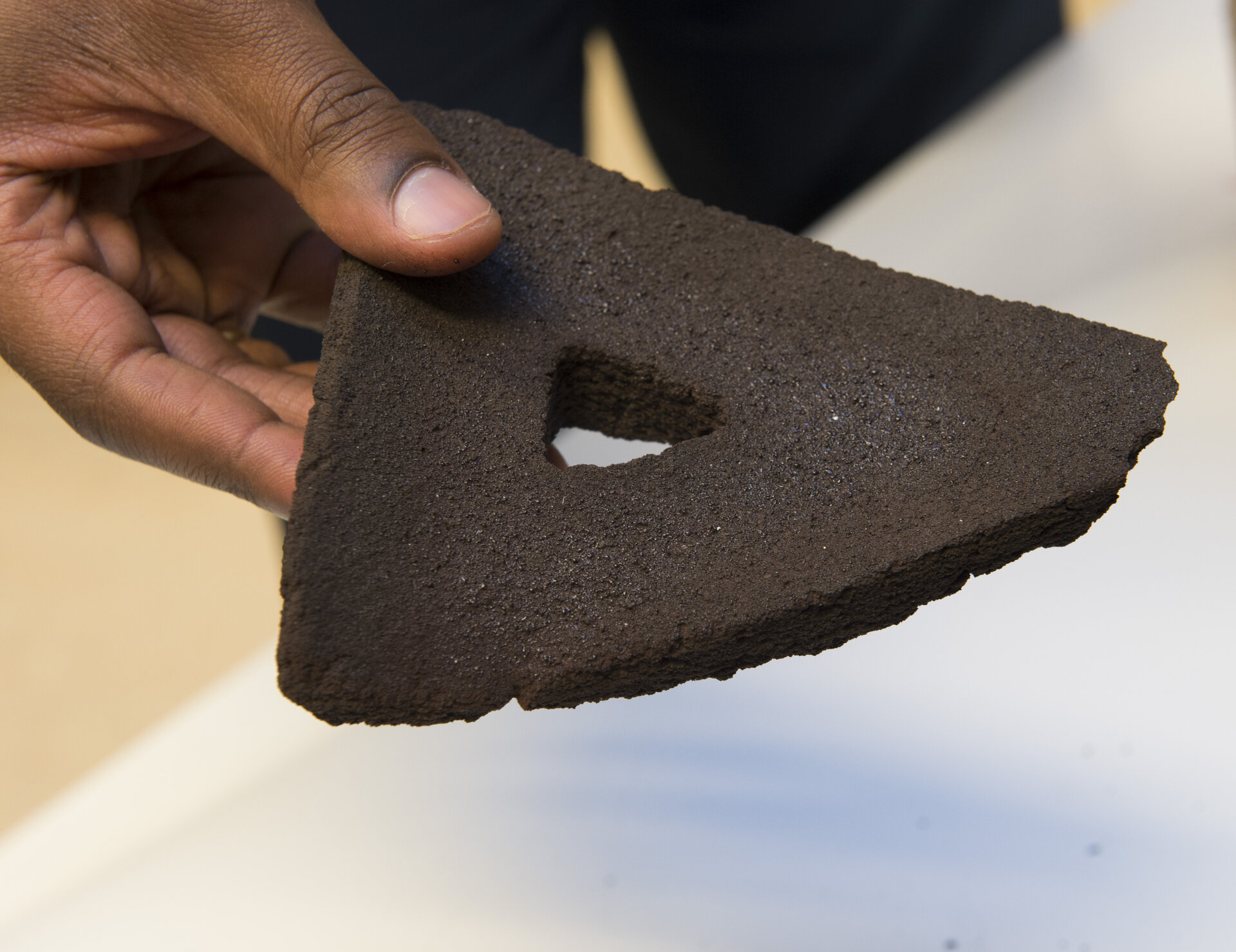 Brick 3D printed from moondust using focused sunlight