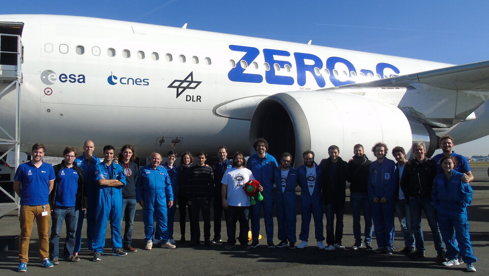 Fly Your Thesis! 2017 students pose in front of the aircraft