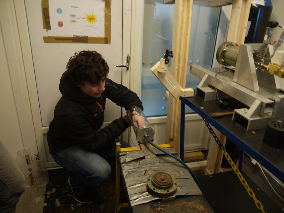Student preparing a hybrid motor test bench