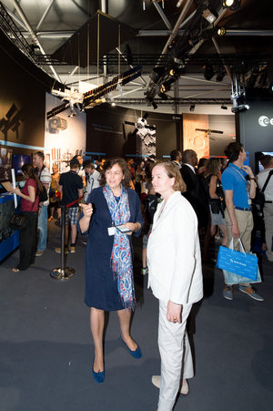 Maria Menendez shows Nathalie Loiseau the ESA Pavilion