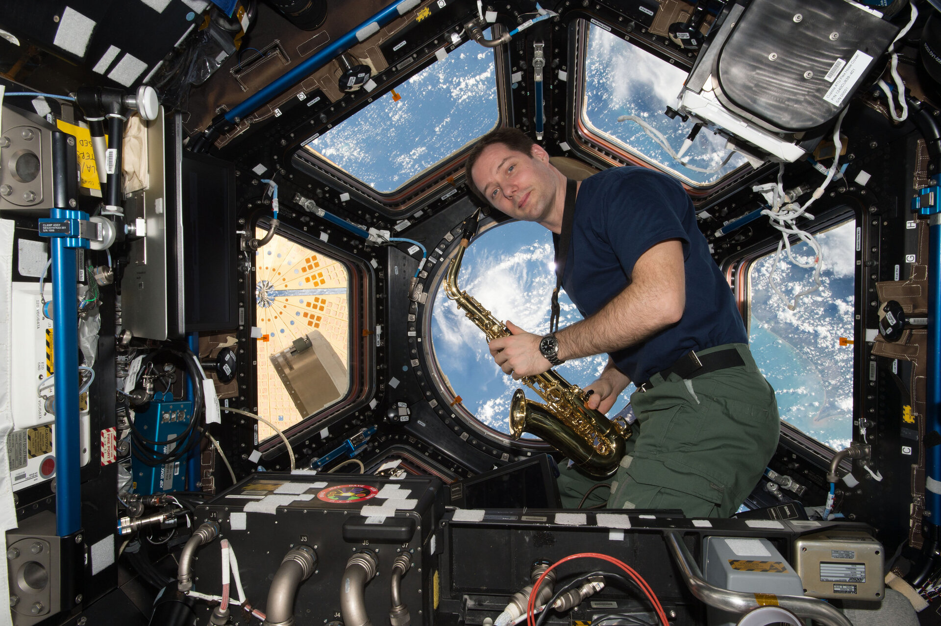 Thomas Pesquet with saxophone in Cupola