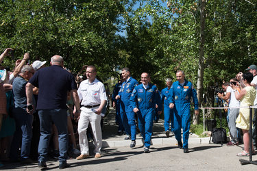 Expedition 52 crewmembers wave farewell to family and friends