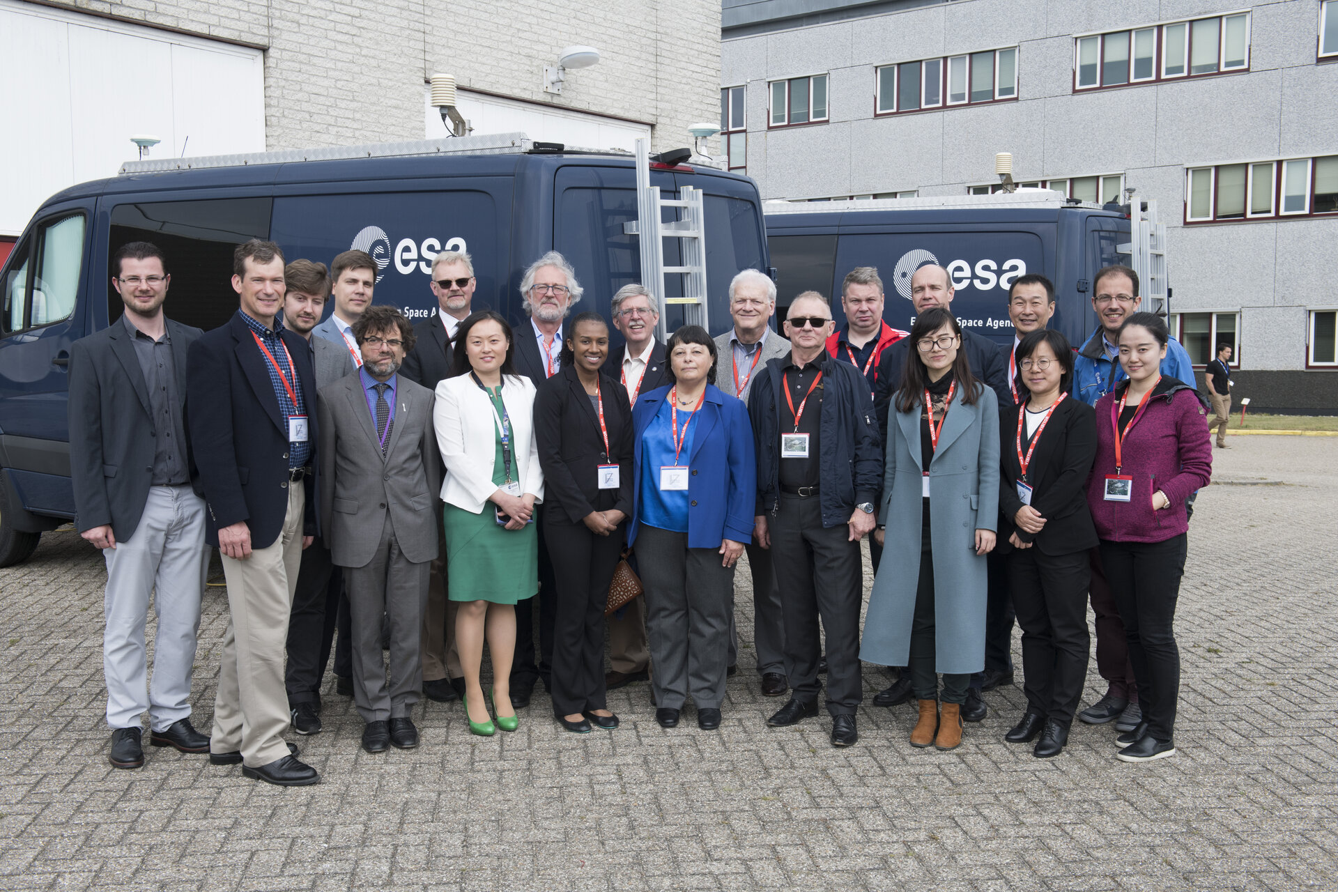 UN ICG delegates beside Galileo vans