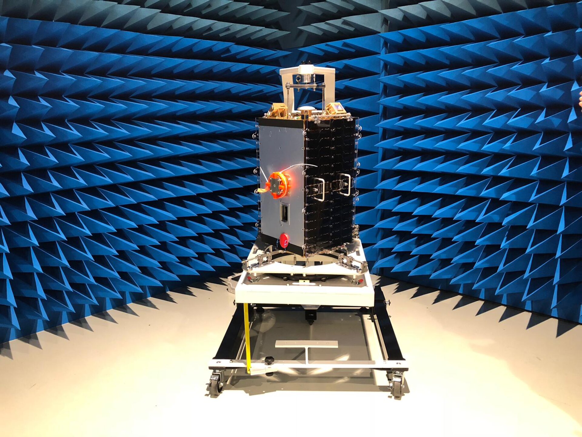 ESEO sits in isometric view on its transportation cart inside an anechoic chamber