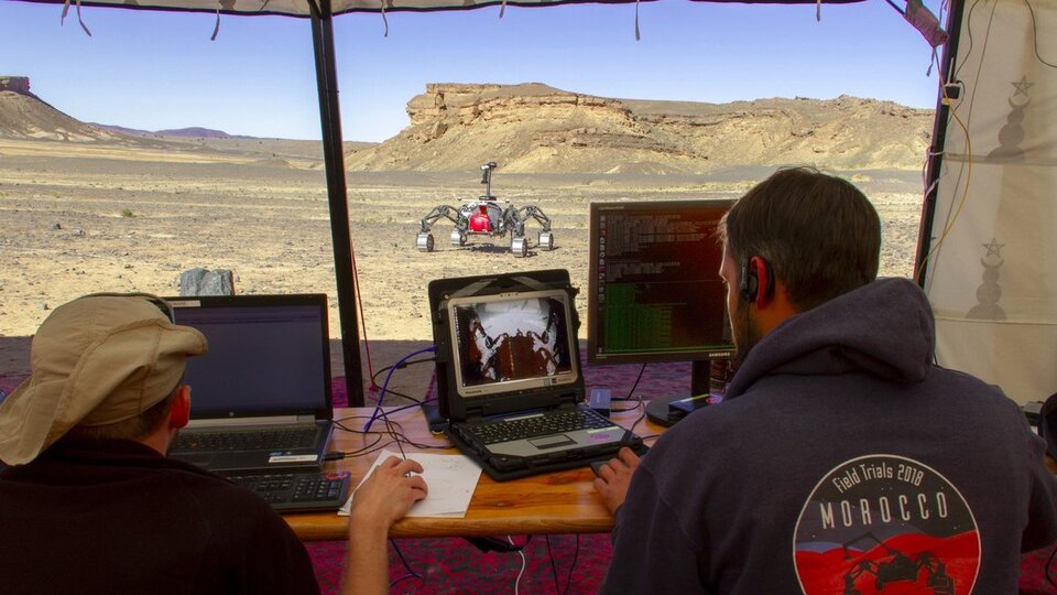 Engineers observing rover progress