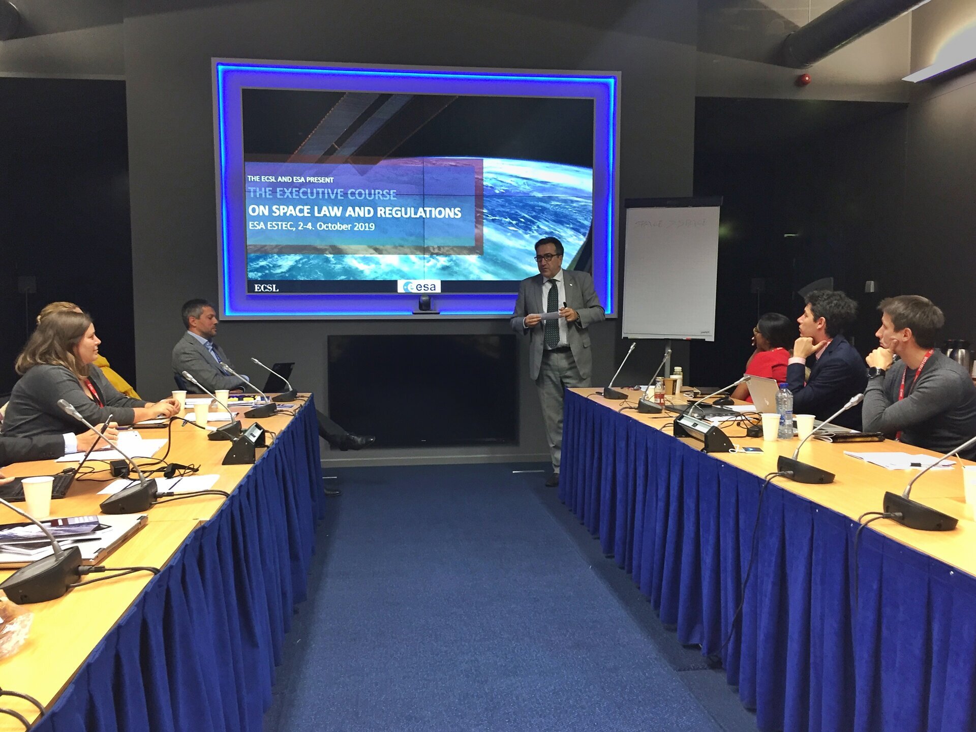The ESA/ECSL Executive Course in 2019 took place at ESA ESTEC. Seen here are Dr. Marco Ferrazani (presenting) and Alexander Soucek. 