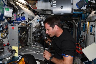 Thomas repairing Space Station exercise bike