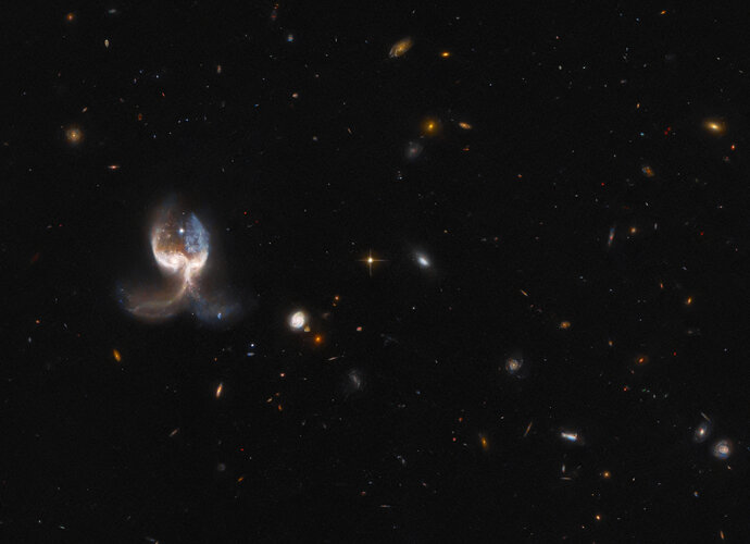 Hubble inspects a set of galactic wings