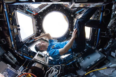 ESA astronaut Matthias Maurer in the Cupola of the International Space Station