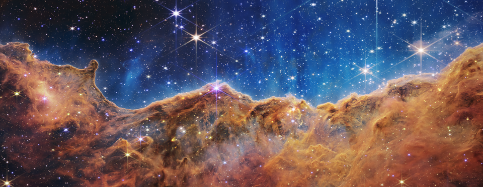 This image of the Carina Nebula is one of the designs available. Captured by the NASA/ESA/CSA James Webb Space Telescope, it features an area of star formation known as the Cosmic Cliffs.