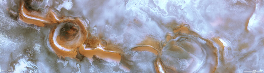 Swirling craterscape at the south pole of Mars