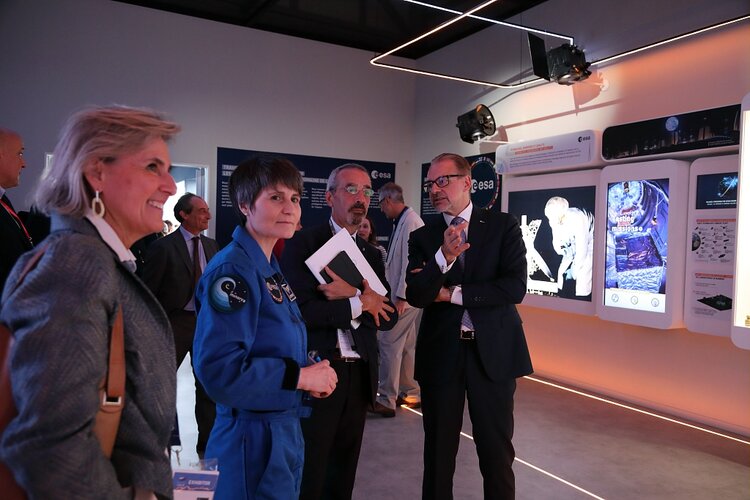 ESA astronaut Samantha Cristoforetti and Teodoro Valente, President of ASI, visit ESA's exhibition with ESA Director General Josef Aschbacher and Simonetta Cheli, ESA's Director of Earth Observation.