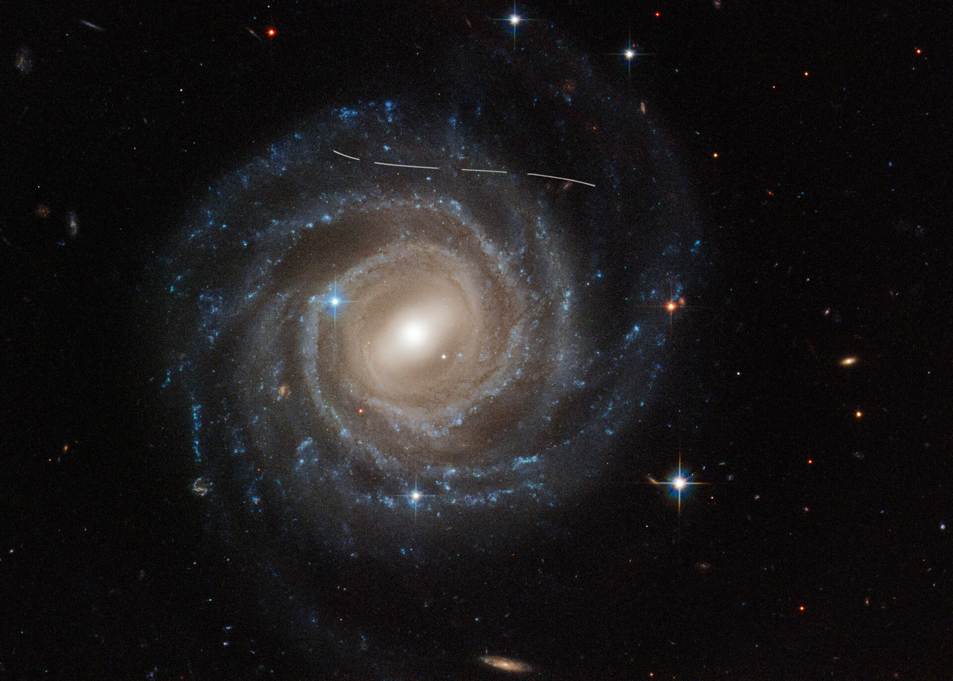 Asteroid photobombs Hubble snapshot of Galaxy UGC 12158